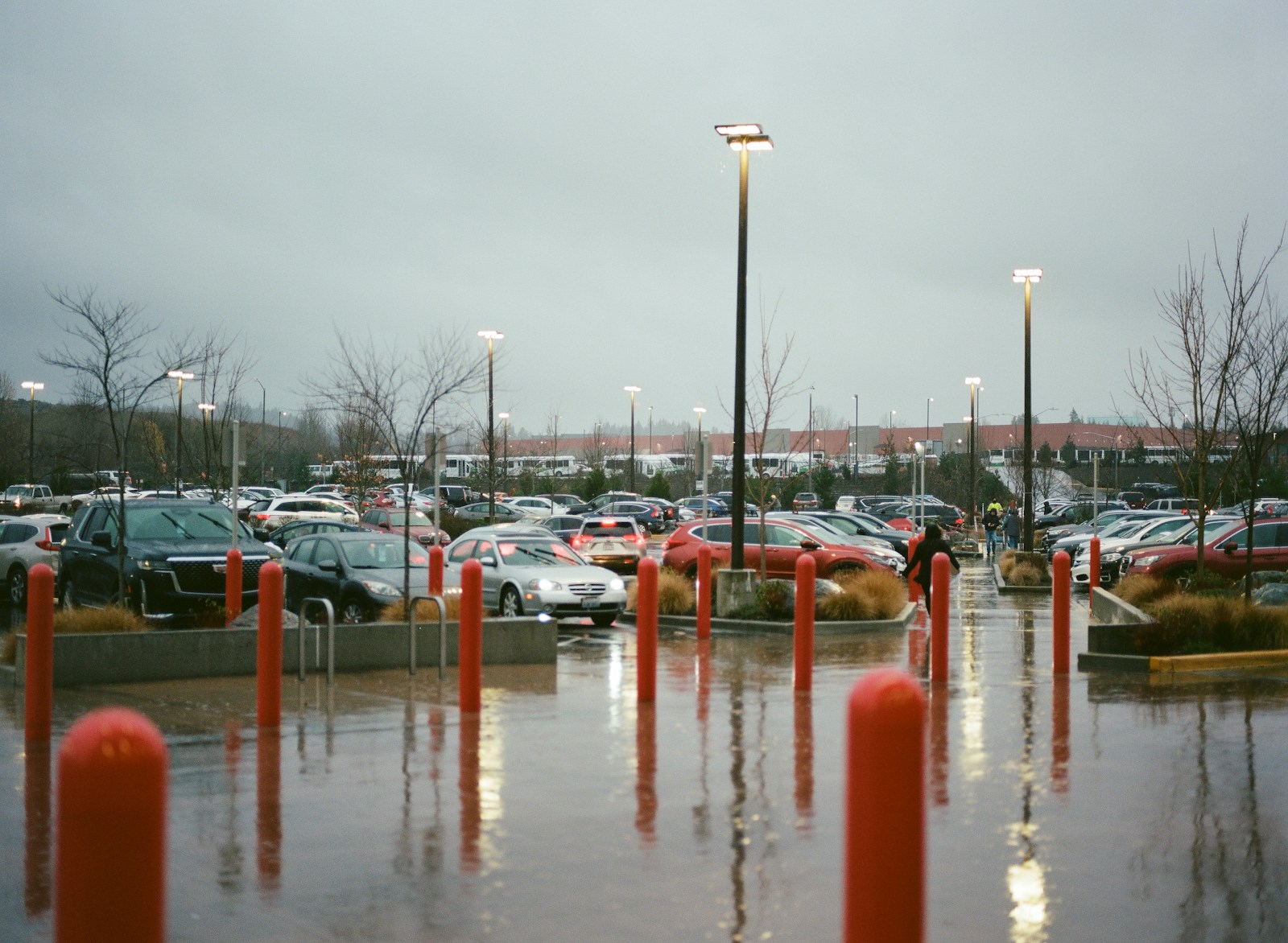 a parking lot filled with lots of parked cars